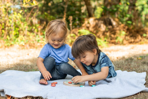 kids playing bug tic tac toe painted rocks epoxy ladybug lovebug bumblebee bee wood round picnic